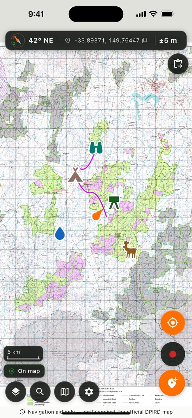 The Bushwise map screen: a DPIRD topographic forest map with compass heading, coordinates and GPS accuracy across the top, several markers and a recorded track.